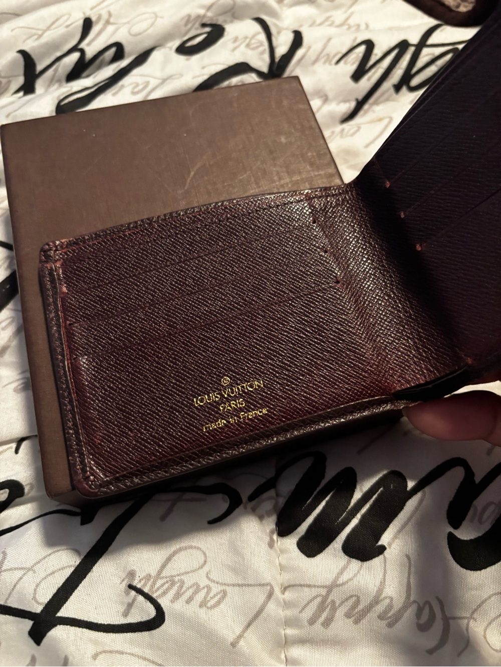 Louis Vuitton Dark Brown Textured Leather Bi-Fold Wallet - Picture 2 of 8